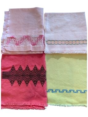 Set of four vintage huck embroidery towels